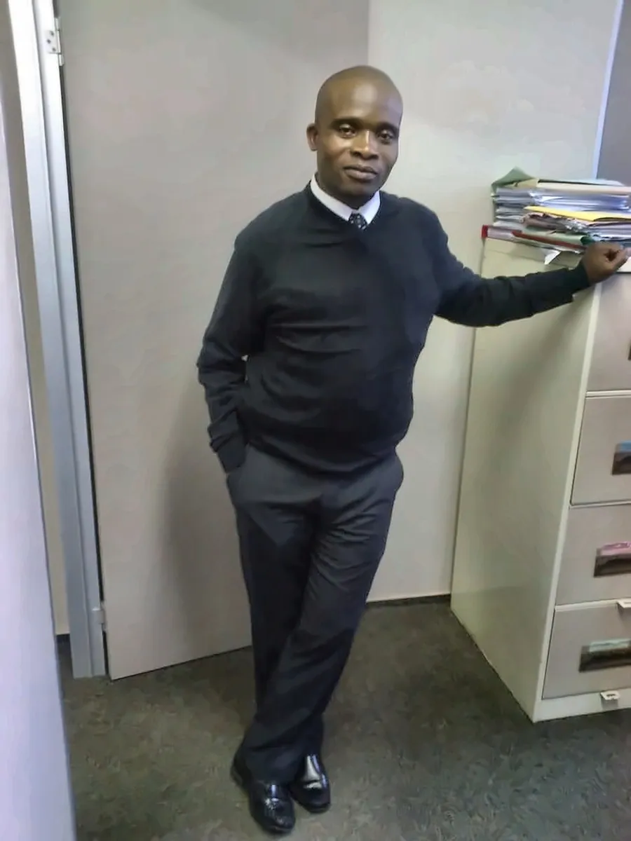 Attorney in professional attire at an office