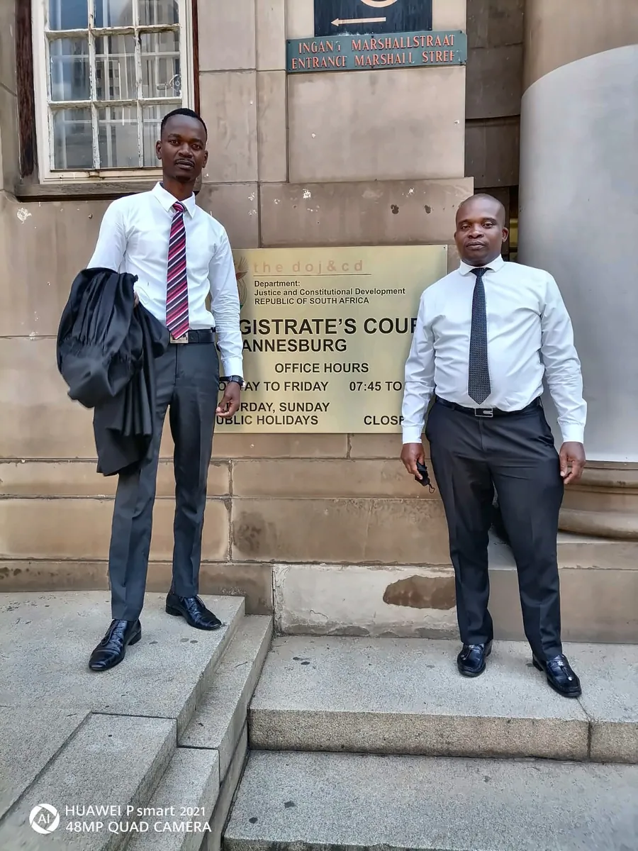 Two professionals outside the Johannesburg Magistrate’s Court