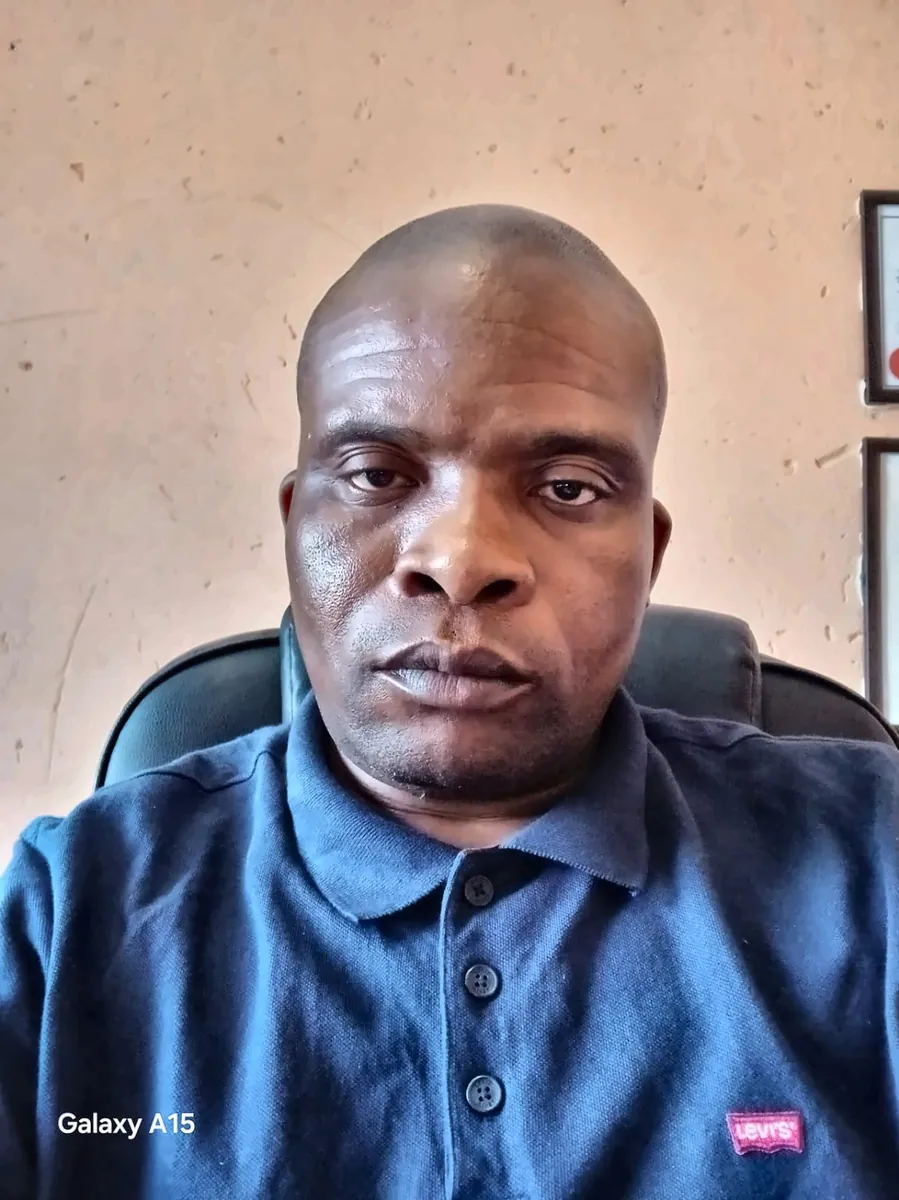 Professional portrait of an attorney seated in an office